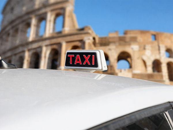 Taxi bianco a Roma con tariffe regolamentate per trasferimenti dal quartiere Laurentino